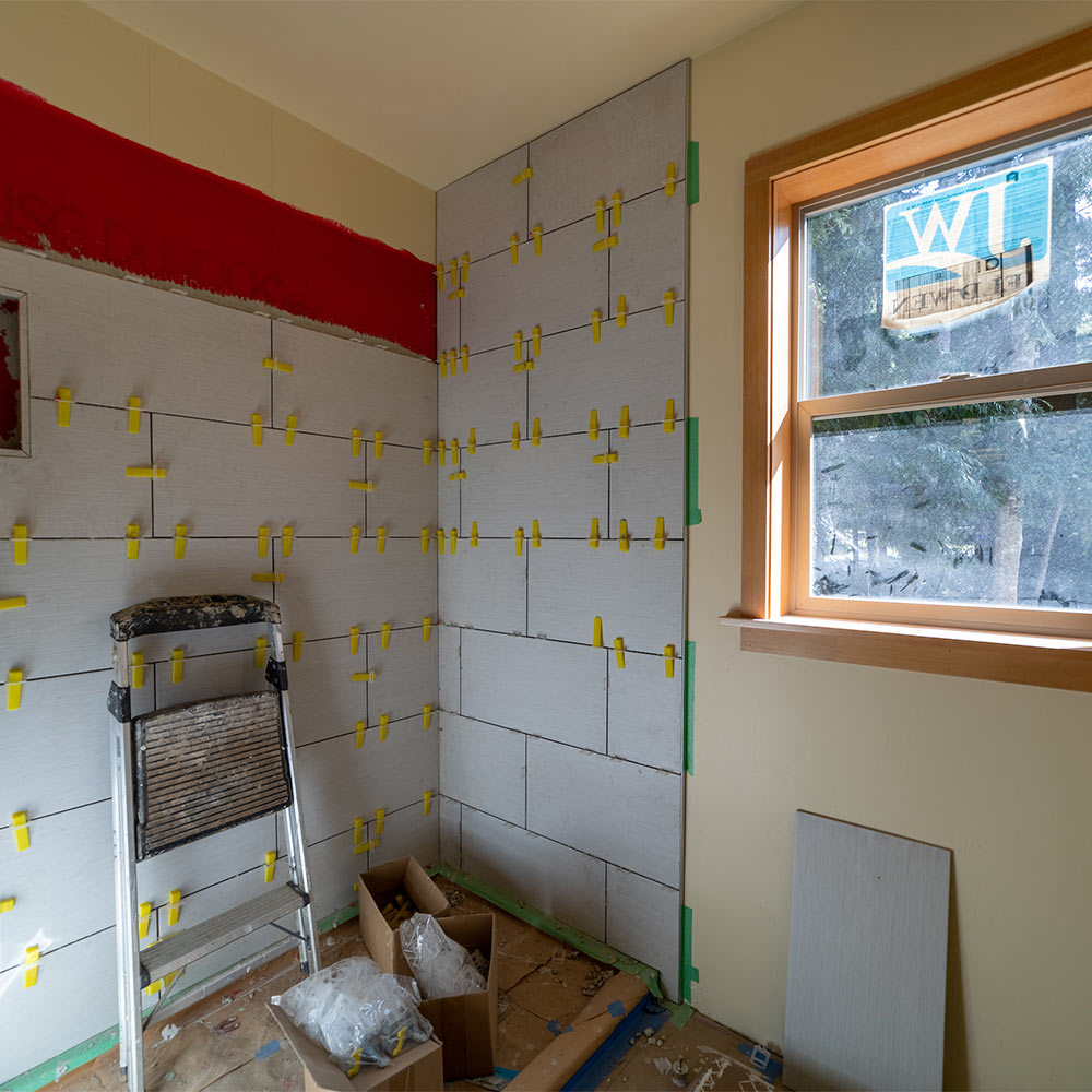 Shower under construction in the interior of ADU.